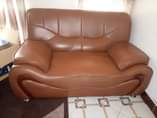 A picture of Comfortable second hand set of chairs it s center table
