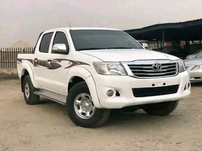 A picture of PRE OWNED Super Clean 2014 Barely Driven Toyota Hilux With
