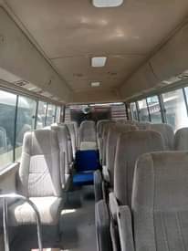 A picture of Toyota coaster bus...3RZ engine...year 2015...AC working perfectly... price 24m DM