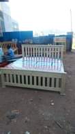 A picture of King size simple bed in natural colour