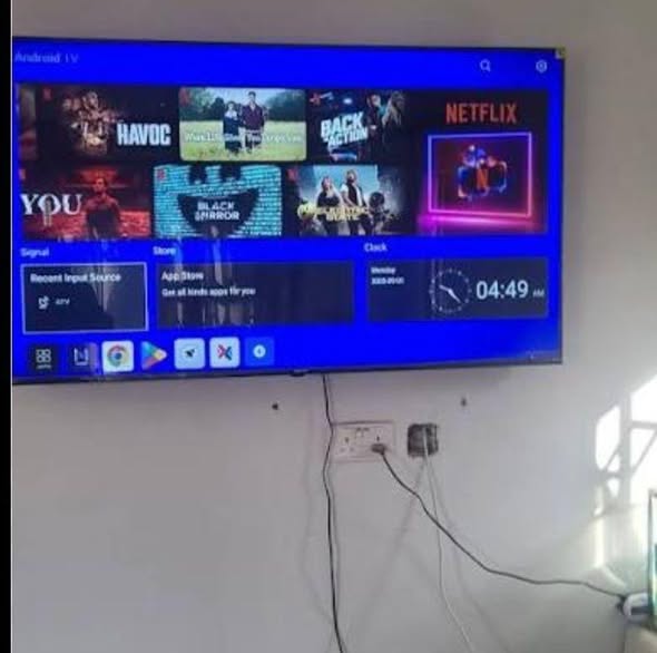 A picture of Smart Android TV with wall mount