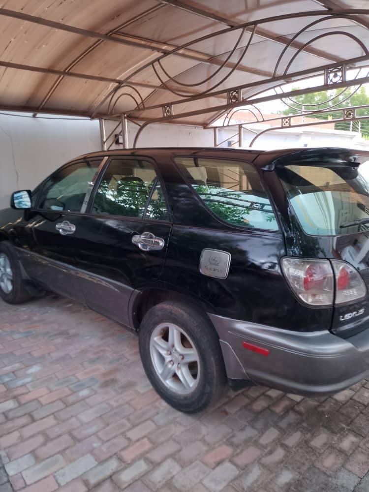 A picture of REGISTERED MAKE LEXUS MODEL RX300 YEAR 2004 CONDITION BUY AND