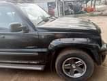 A picture of REGISTERED 2003 LIBERTY JEEP 4X4 ENGINE GEAR AC AND ALL