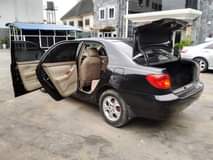 A picture of Sharp buy and drive 2004 Toyota Corolla with everything working