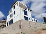 A picture of mashamba nyumba viwanja karib