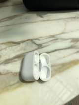 A picture of AirPods Pro original model A2084 100 wats up or call