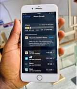 A picture of iphone 8plus in golden color fingerprint clean working 64gb swap