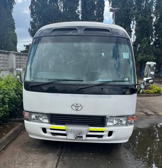 A picture of 55718998880 Coaster Ndefu Milion 45tsh Engine 1HZ Full A C