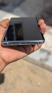 A picture of Samsung S10 Network 5G Storage 256Gb Contact 0756395061 Ipo clean