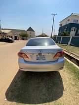 A picture of 2011 Dubai Corolla extremely clean just few months use and