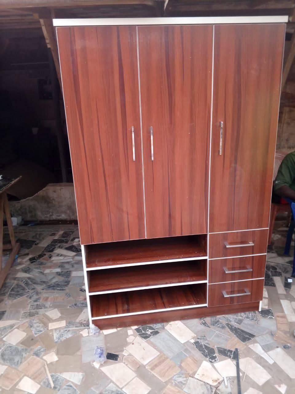 A picture of TV console wardrobe and centre table