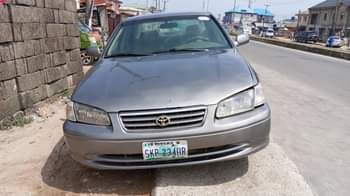 A picture of Toyota Camry Drop light Gear Engine Ac needs attention 1