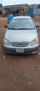 A picture of 2004 registered Toyota corolla engine gear and Ac is 100