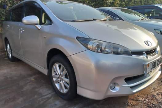 A picture of WISH 2011 7 Seater Black interior 0750147312. Nakasero Road near
