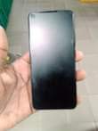 A picture of Infinix with some cracks 300k