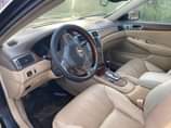 A picture of Owner needs money urgently es330 perfect condition year 2005 going