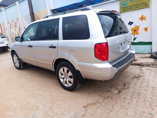 A picture of Toks standard registered 2005 Model Honda Pilot Super clean in