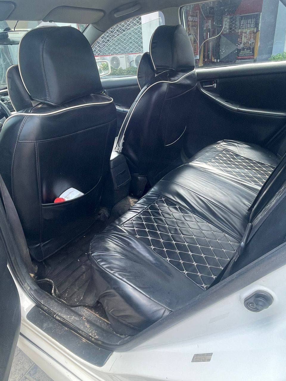 A picture of Sharp 04 Toyota Corolla with untouched engine gear and AC