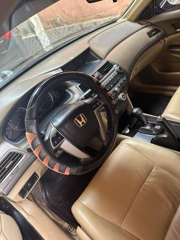 A picture of 2010 Honda Accord pure first body untampered engine and gear