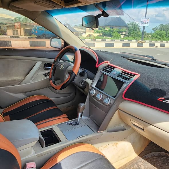 A picture of NEATLY USED 2010 TOYOTA CAMRY HAS A CLEAN INTERIOR WITH