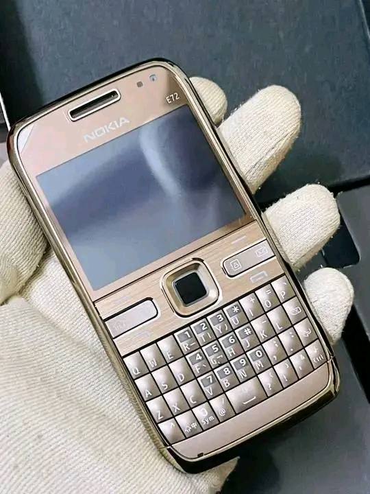 A picture of QWERTY KEYBOARD BUTTON PHONE NOKIA E72 WITH WHATSAPP FACEBOOK YOUTUBE