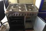 A picture of OVEN KUBWA ZIMEKUJA Plate 4 gas plate 2 umeme Upande