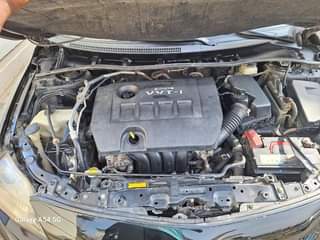 A picture of 09 Corolla super sharp with untampered engine and gear chilling