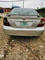 A picture of Toyota Camry 2004 4 plug Painted on first body Clean