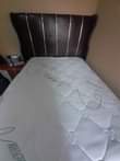 A picture of Nature foam Mattress and Double head board Hisence fridge Microwave