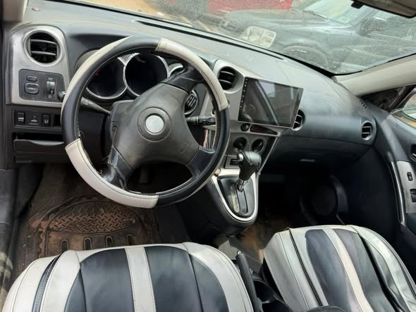 A picture of First Body but need painting Toyota matrix 05 Engine gear