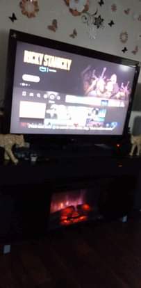 A picture of 60 tv fire place electric with Bluetooth sound bar