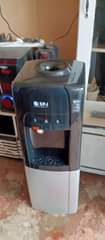 A picture of SPJ water dispenser with Hot water Warm water and Cold