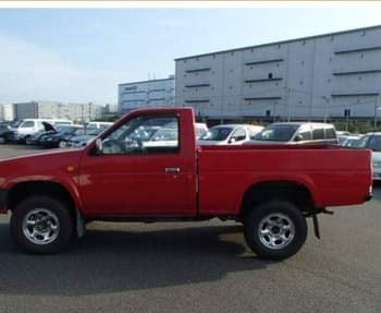 A picture of 1990 NISSAN DATSUN PICKUP THE VEHICLE PRICE IS 650 000