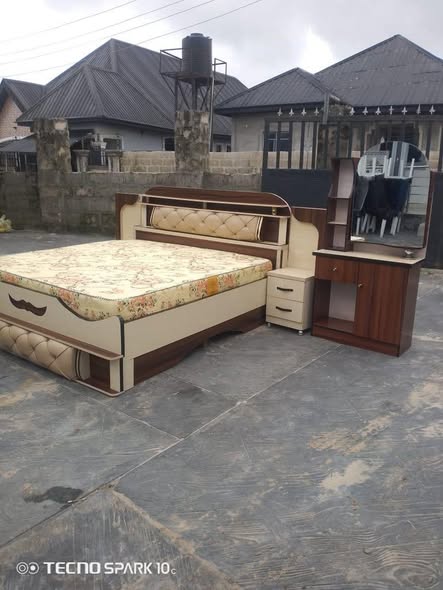 A picture of 6by6 complete set of bedframe and foam with two side