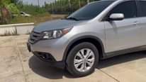 A picture of FORIEGN USED 2012 HONDA CR V WITH COMPLETE ORIGINAL PAPERS