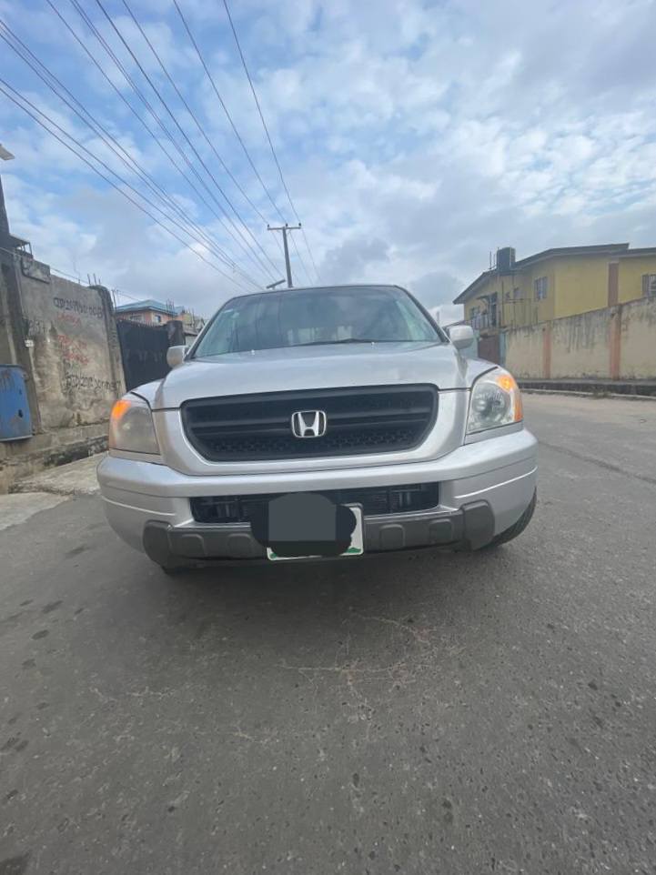 A picture of HONDA PILOT 2005 MODEL REGISTERED SUPER CLEAN CAR NOTHING TO