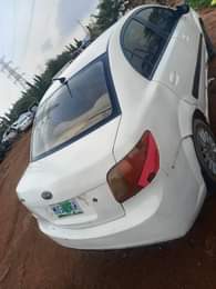 A picture of low budget car 2008 model Kia Rio manual transmission going