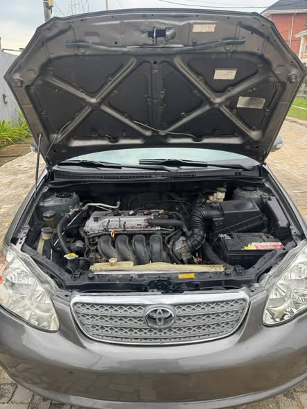 A picture of Toyota corolla 06 sharp engine and gear ac needs atten