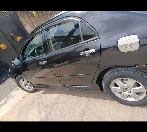 A picture of AWOOF DEALERS DEAL TOYOTA COROLLA 04
