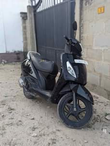 A picture of Tvs Jupiter Scooter