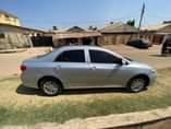 A picture of 2011 Dubai Corolla extremely clean just few months use and