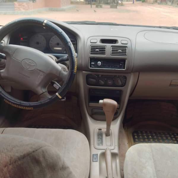 A picture of Corolla 2001 Engine Gear AC Needs Gas Clean fabric interior