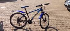 A picture of Mountain Sports Bicycle with Helmet