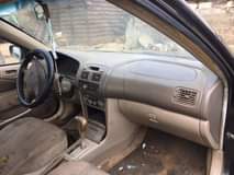 A picture of Corolla for sale the engine is tapping and no battery
