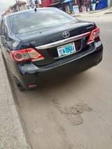 A picture of Super clean 2010 Toyota corolla with metal sound first flash