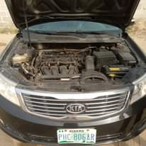A picture of Clean Kia optima 2010 model For give away price Going