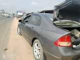 A picture of A very clean Toyota Camry tiny light going Engine and