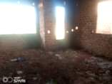 A picture of A shell house for sale in Namugongo sonde hill view.
