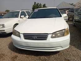 A picture of WHITE A Neatly Used Toyota Camry pencil 2002 Model With