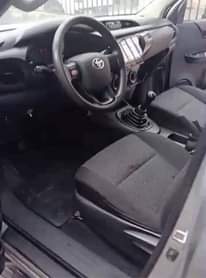A picture of 2023 manual hillux six months used bought brand new